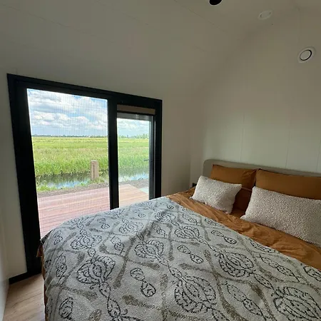 Tinyhouse Ochtendgloren * Haastrecht